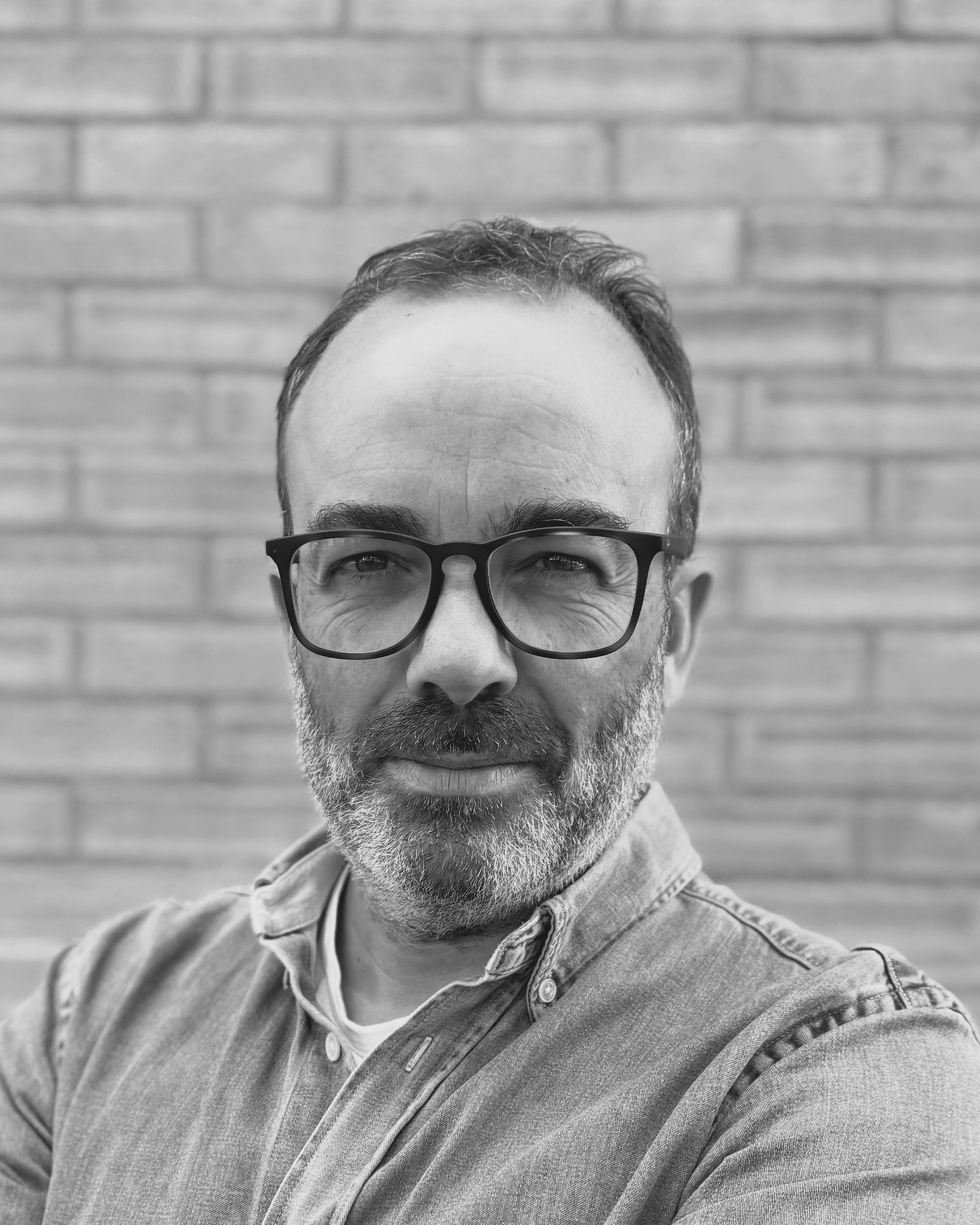 Portrettfoto av Joakim Sande, ansvarlig for strategi og merkevare
